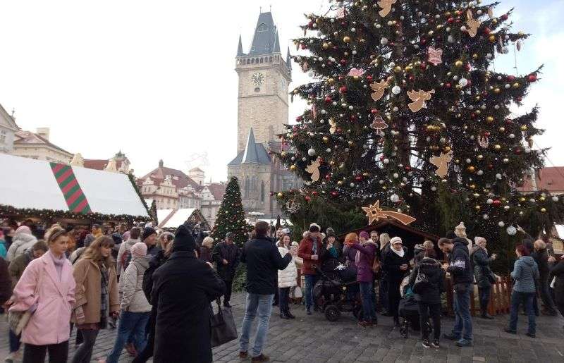 Crowd in the Old Town nearby Xmas Tree and Xmas Market