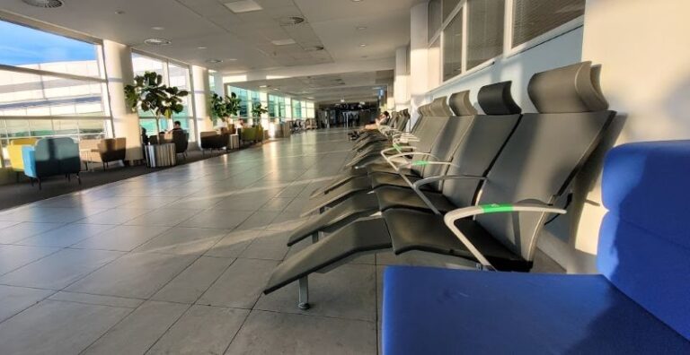 Reclining seats with headrests and leg supports in the Terminal 1 air-side relaxation zone at Prague Airport